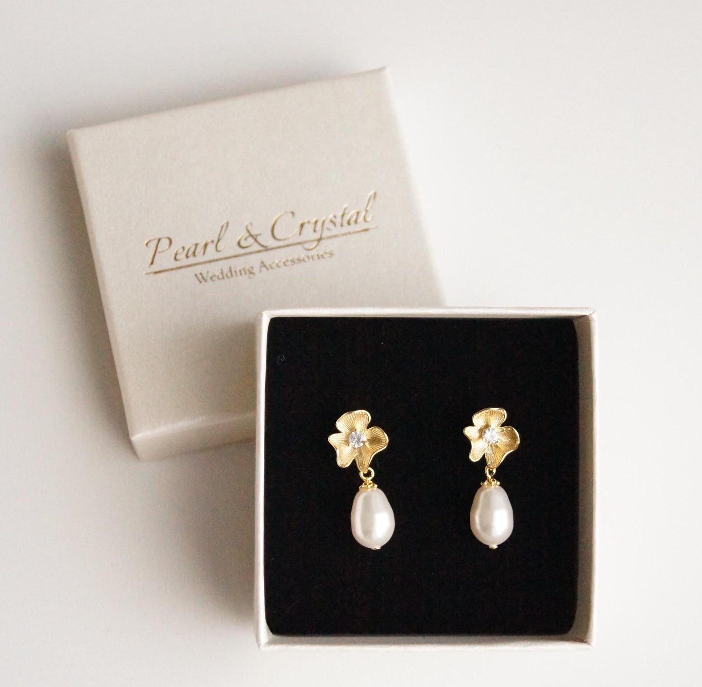 Ohrringe mit Swarovski-Perlen & Zirkonia